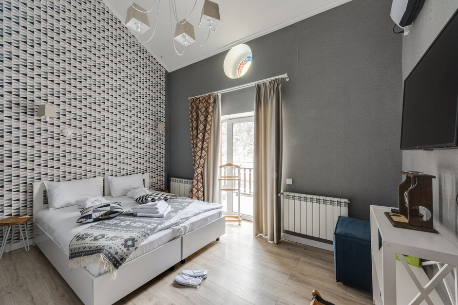 Elegant hotel room with modern design and luxurious decor elements.